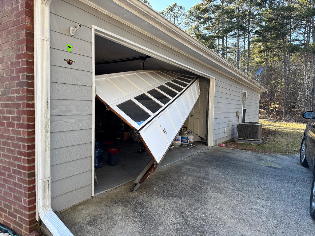 What to Do If Your Garage Door Comes Off Track